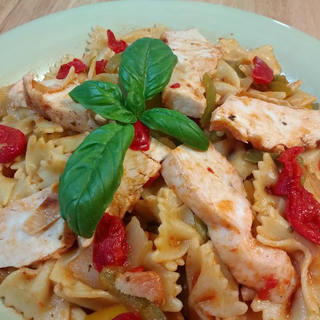 Farfalle and Chicken with peppers and onions. Quick chicken dinner