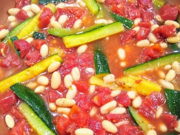add in the beans and tomatoes