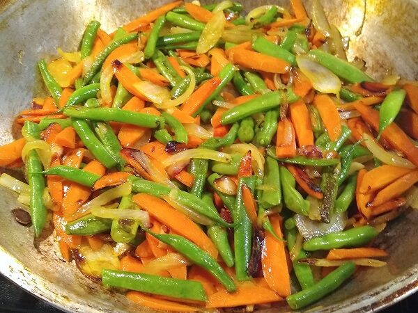 sauté green beans and carrots for 8 minutes