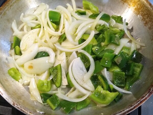sauté peppers and onions