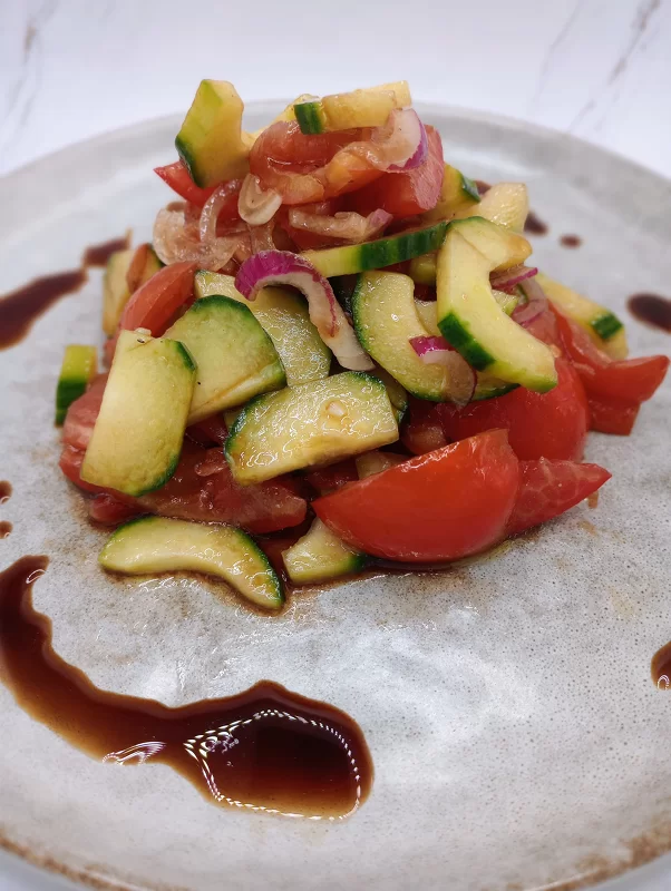 Cucumber and Tomato Salad Plated