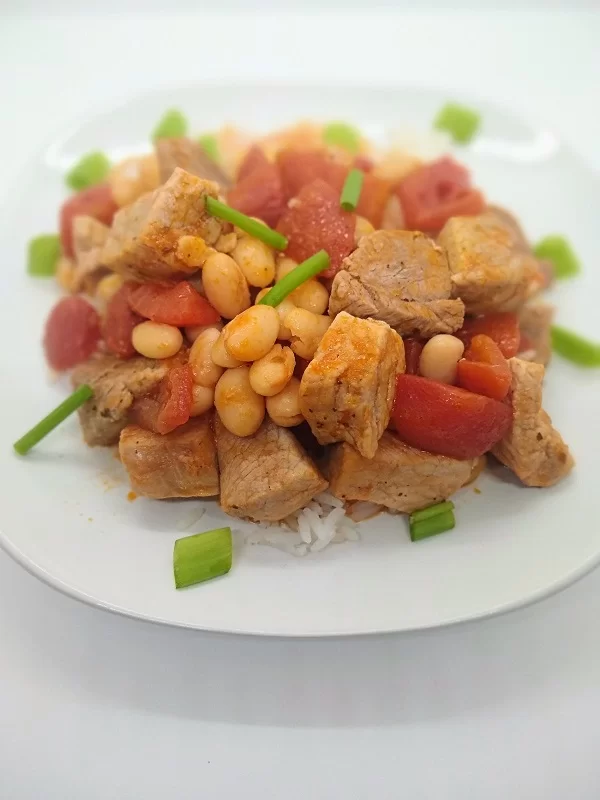 Pork with beans and tomatoes recipe