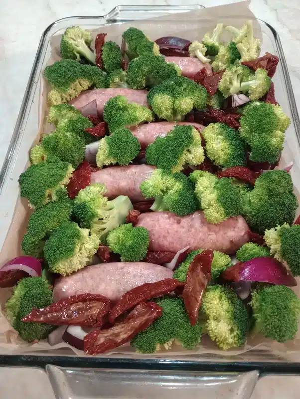 One-Pan Italian Sausage_Sausage and broccoli recipe in the oven before baked