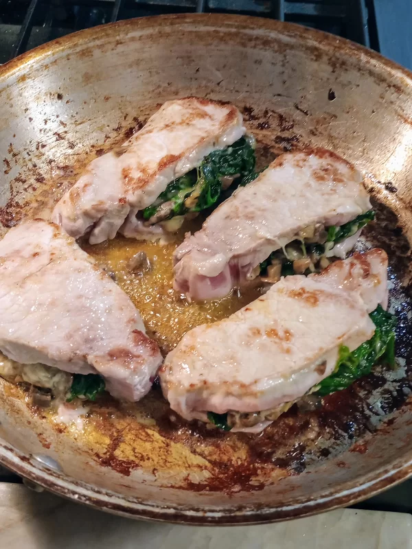 Spinach and Mushroom Stuffed Pork Chops Stuffed In Pan
