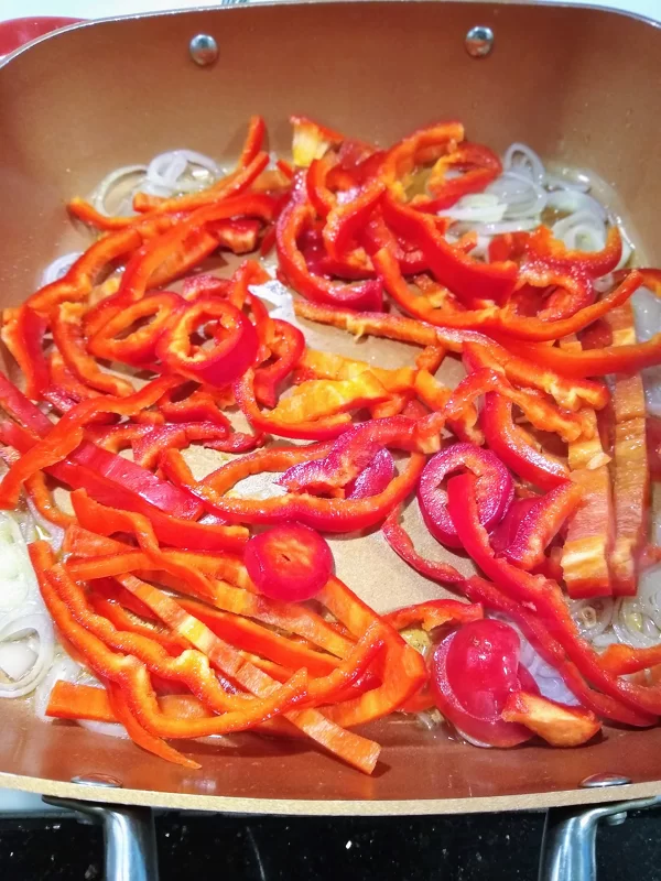 Stir Fry Vegetables with Quinoa: Sauté Peppers